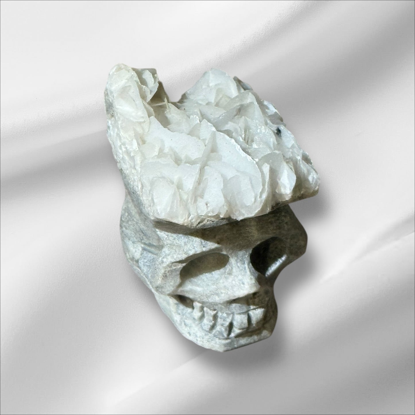 C12-71 Angel Wing Calcite Skull UV+