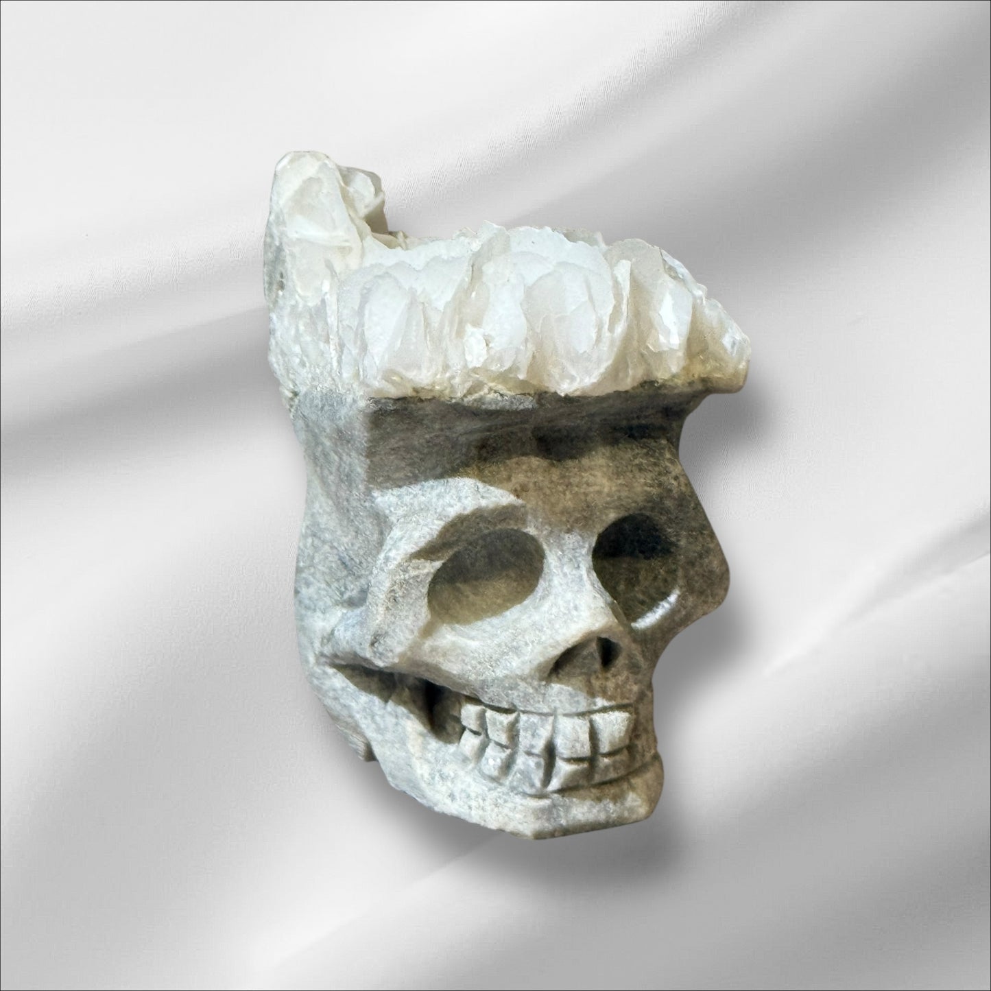 C12-71 Angel Wing Calcite Skull UV+
